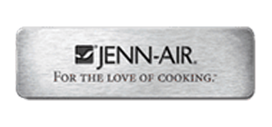 A brushed metal plaque with the Jenn-Air logo and the slogan For the love of cooking.